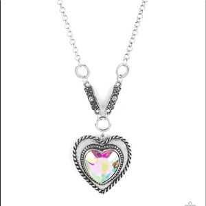 NWT Irredesent Heart Necklace with matching earrings.